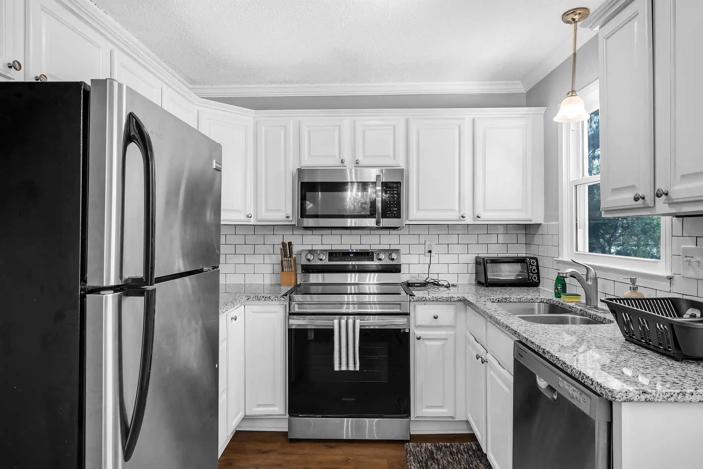 The kitchen leads you to The Patio Pad :)