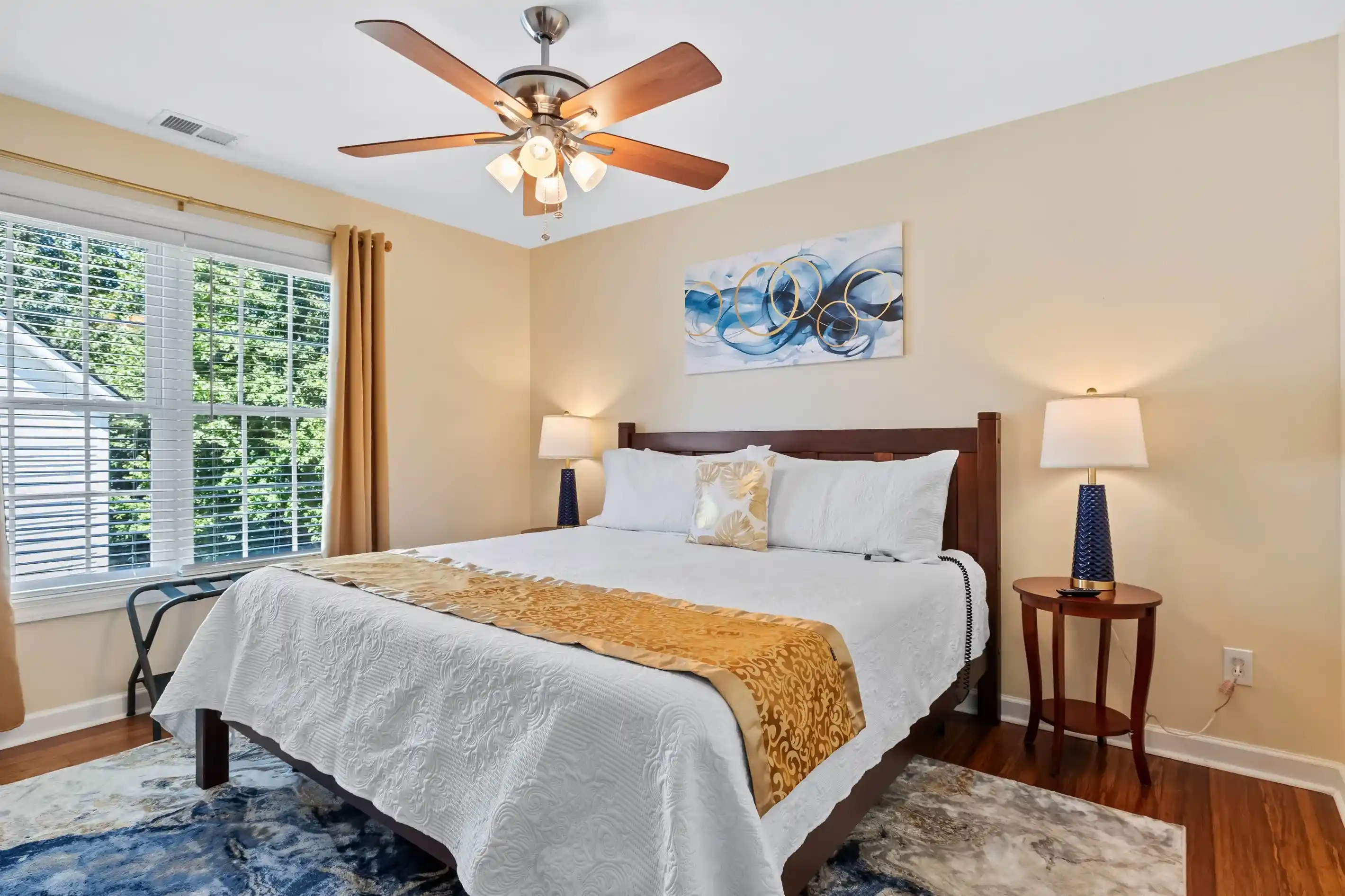 One of the 3 bedrooms upstairs, all featuring king beds with adjustable bed frames, 2 nightstands, luggage rack, lamps with USB ports and a TV.