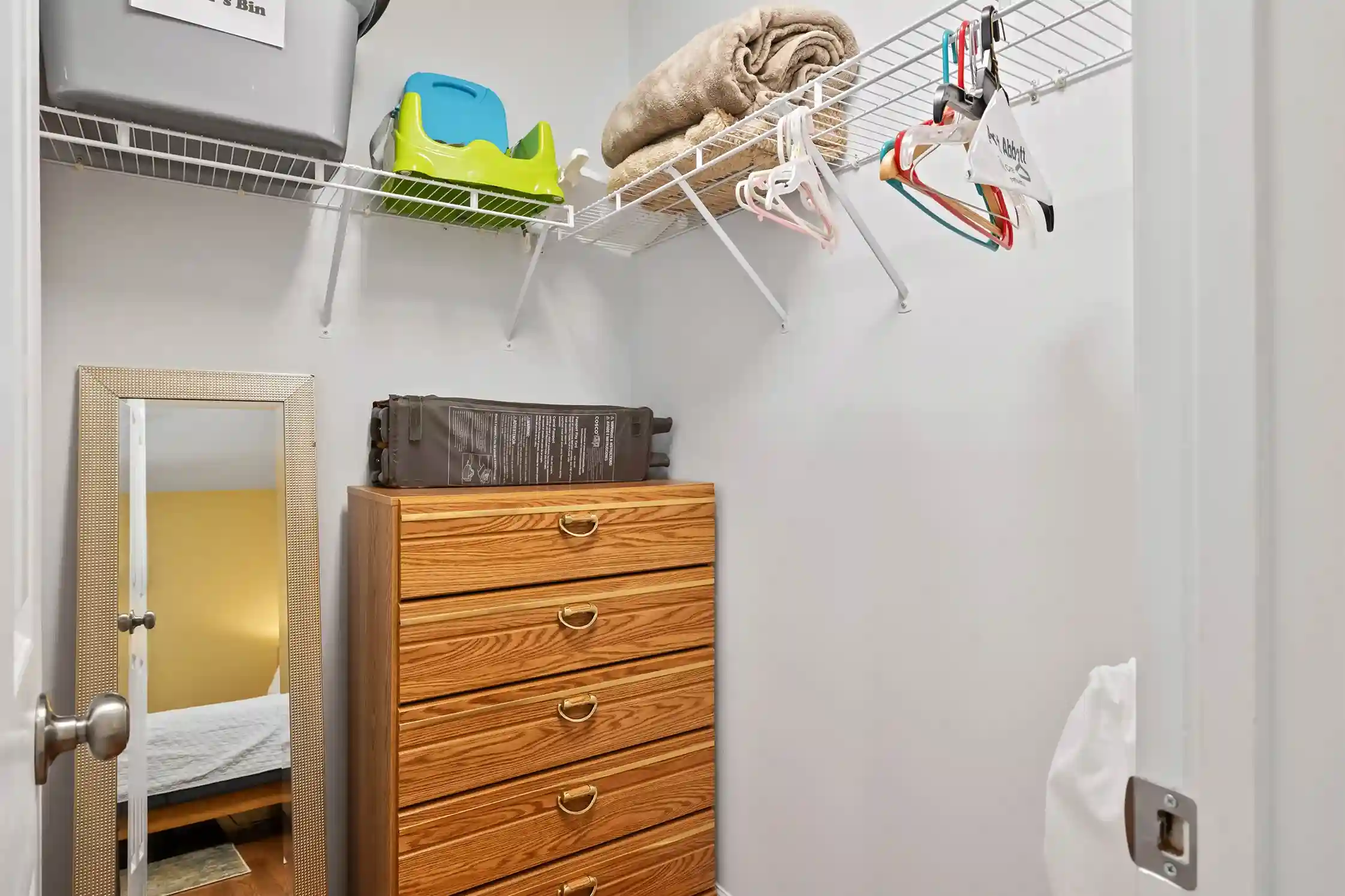 Unpack your clothes and stay awhile! This walk in closet offers a chest of drawers, hangers and a laundry bag. A pack-n-play and booster seat is also provided.
