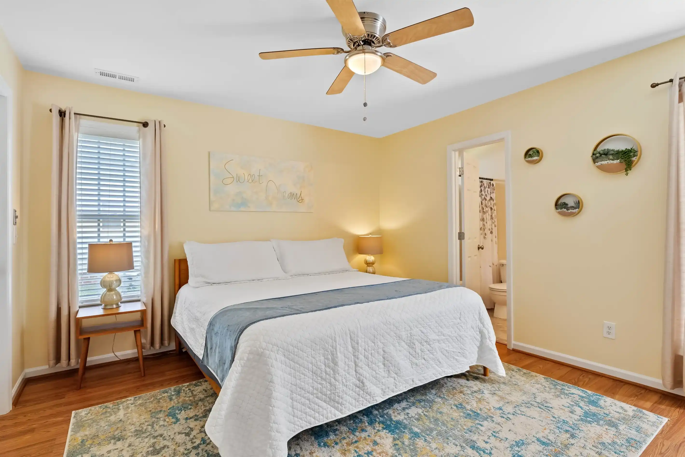 This plush king size bed, with adjustable bed frame, is just waiting for you to sink into it.
