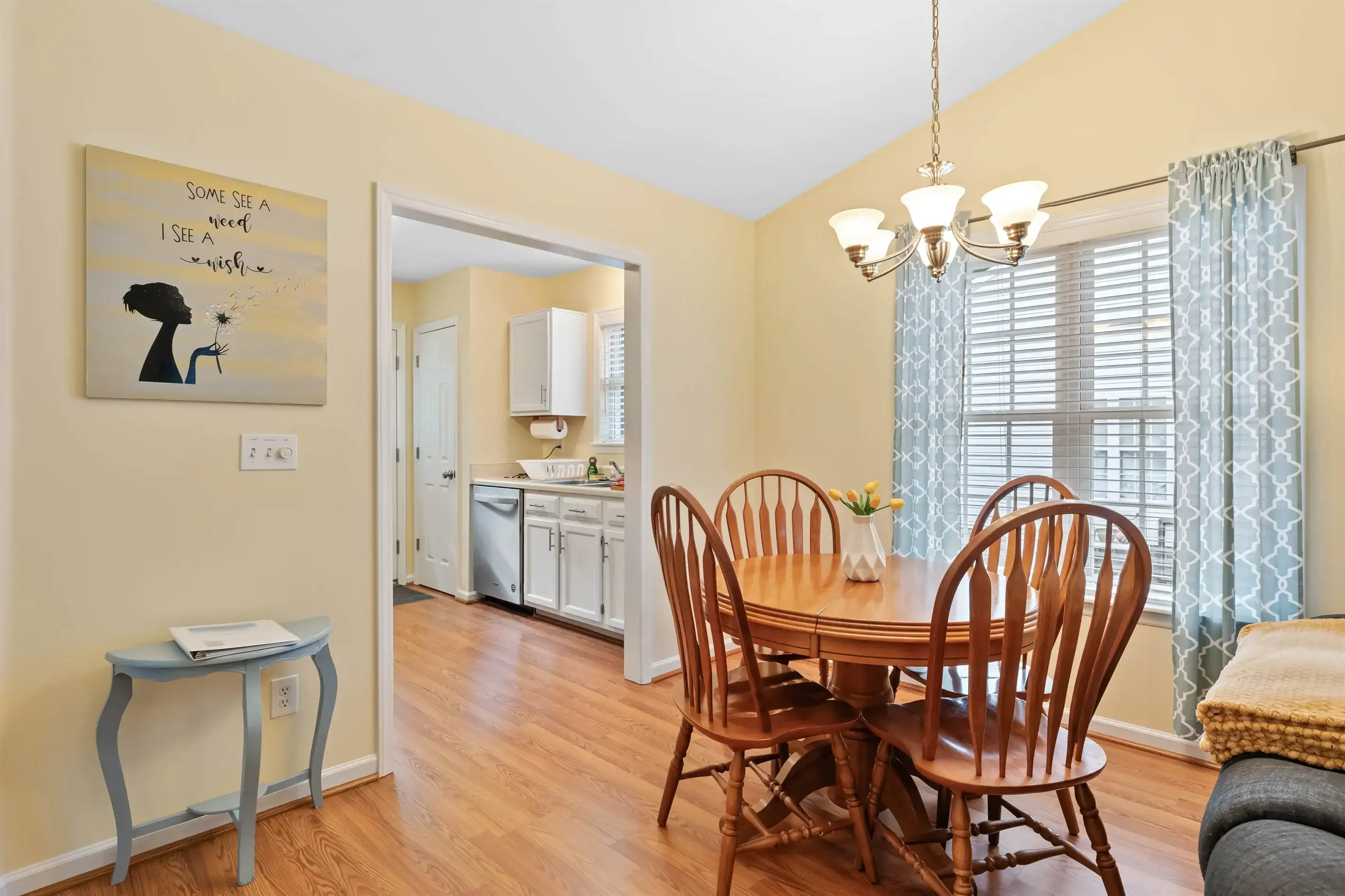 The dining area is nestled between the living area and kitchen.