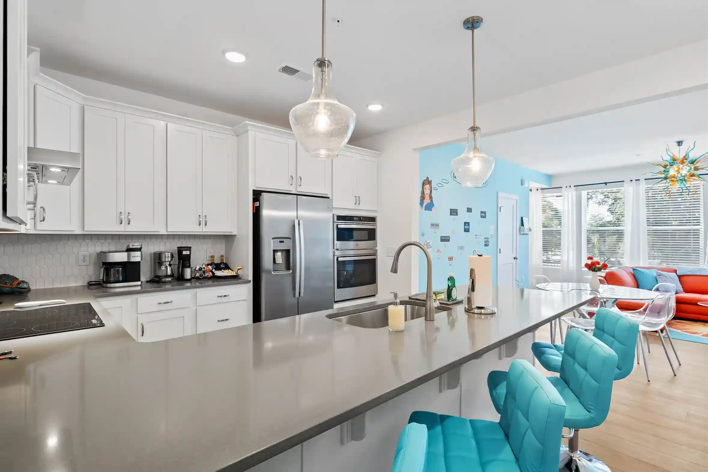 Double oven, stove, microwave and  everything you would need to make a home cooked meal.