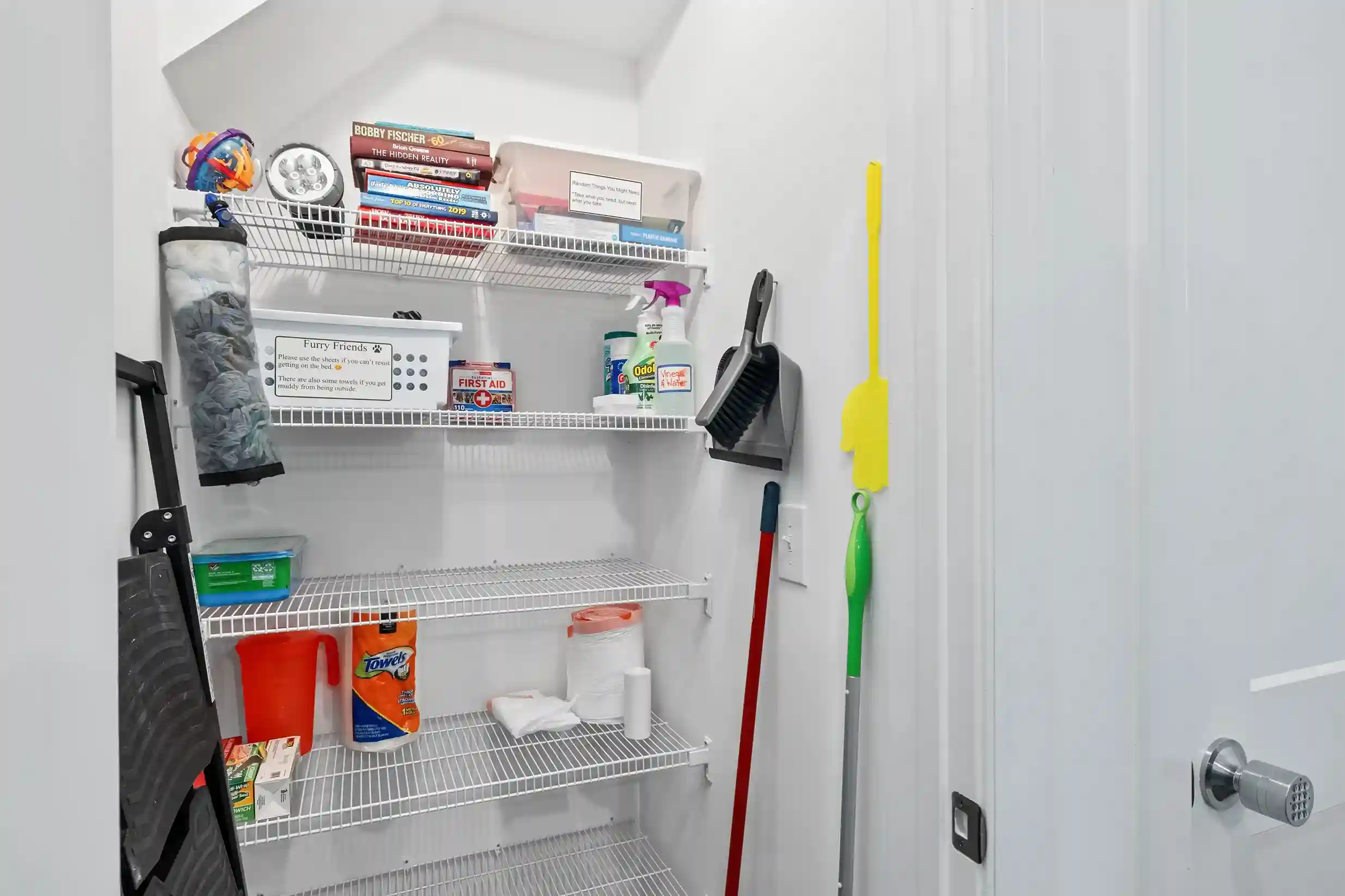 A pantry to store your dried goods. You can also find a doggy basket with food/water bowls and more. There are also some books and games to enjoy on a rainy day.