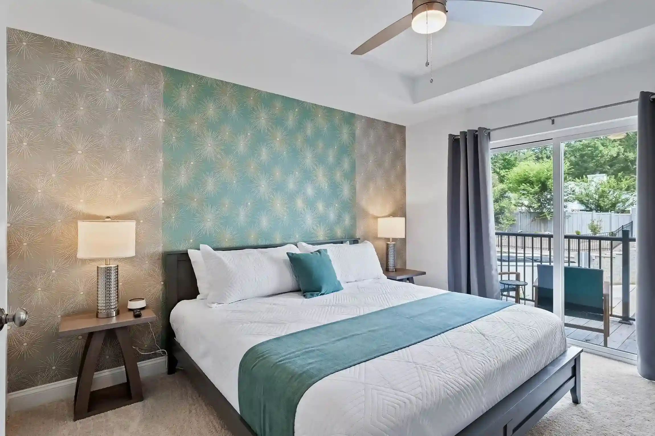 The first guest bedroom has a balcony off of it to enjoy some fresh air.