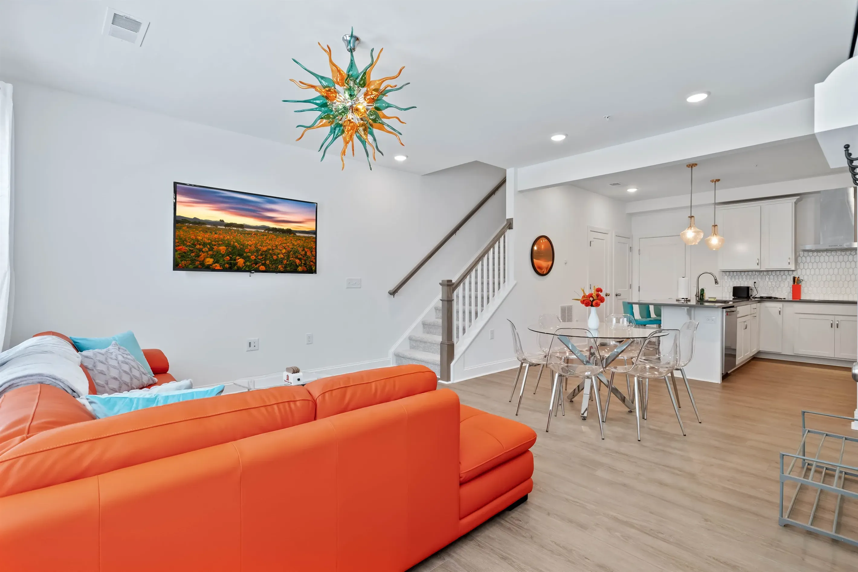 Sink into the leather couch as you watch a show on the 65" Smart TV, where you can log into your favorite apps.