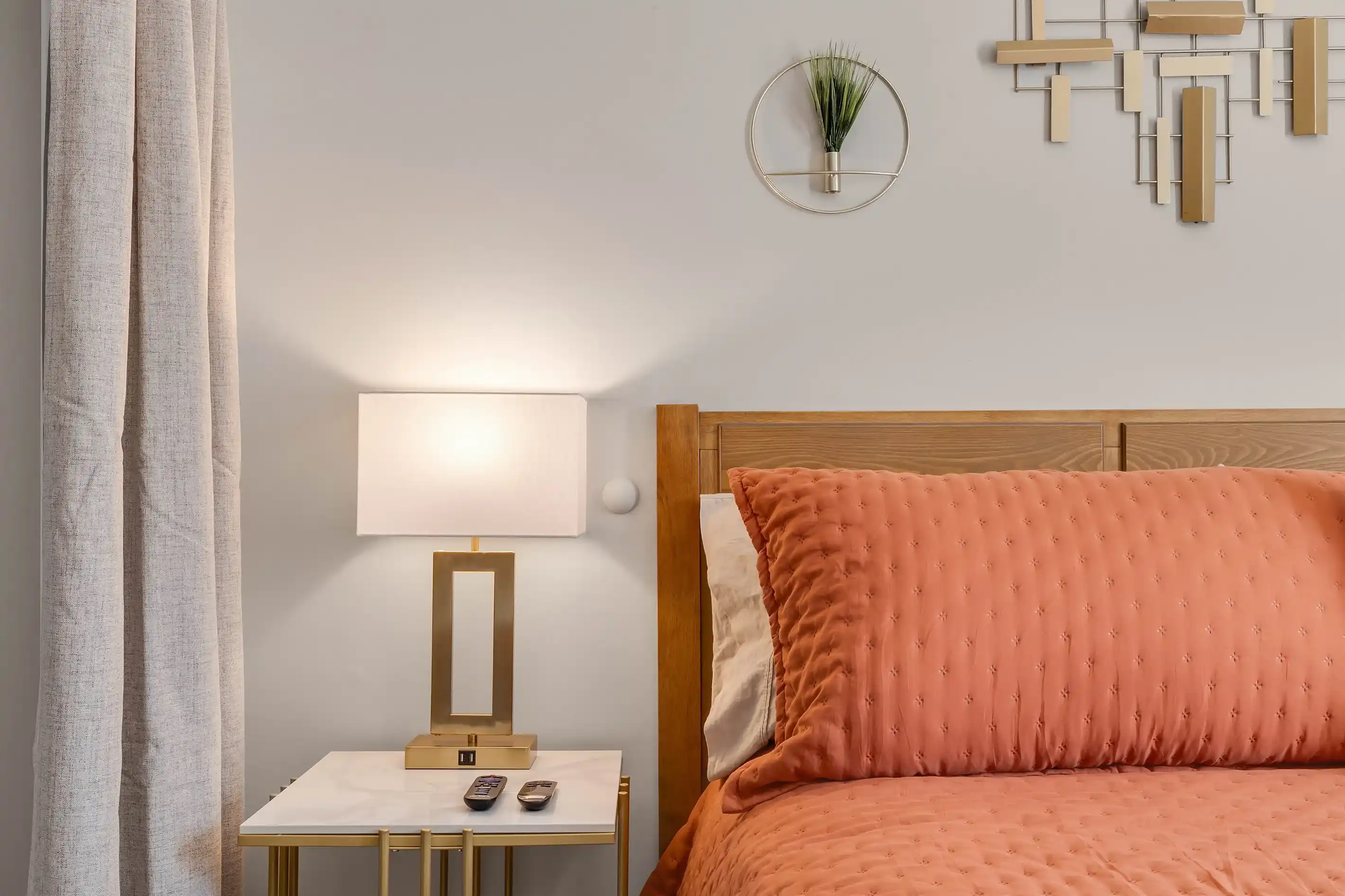 Each bedroom features 2 lamps with USB ports for convenient charging, along with remotes for the adjustable bed frames and smart TVs.