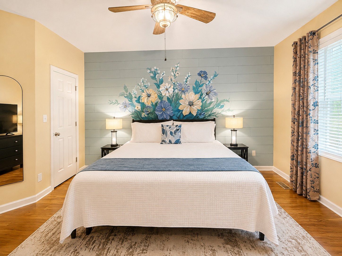 Settle in with everything you need close at hand, including bedside lamps, a dresser, full-length mirror, luggage rack, walk-in closet, and 55-inch TV.