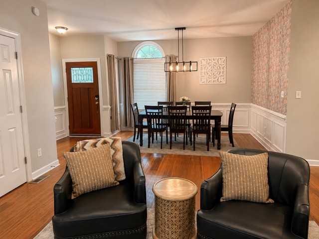 The open layout keeps the living, dining, and kitchen areas connected, making it easy to spend time together.